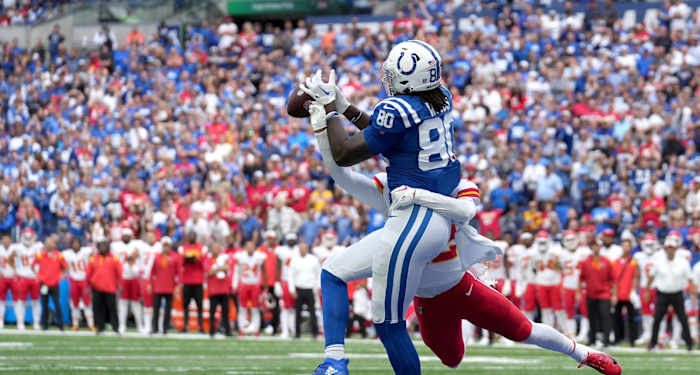 Indianapolis Colts tight end Jelani Woods (80) pulls in a touchdown catch while being guarded by Kansas City Chiefs safety Juan Thornhill (22) putting the Indianapolis Colts ahead with 24 seconds left in the game Sunday, Sept. 25, 2022, during a game against the Kansas City Chiefs at Lucas Oil Stadium in Indianapolis.